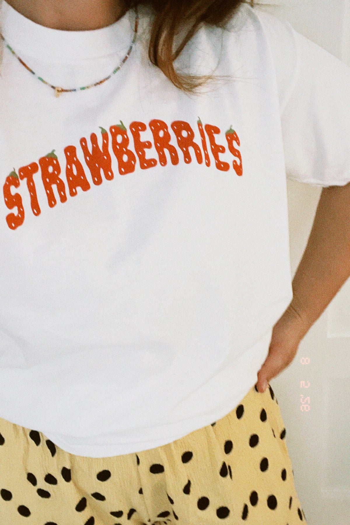 The Strawberries 90's Baby Tee